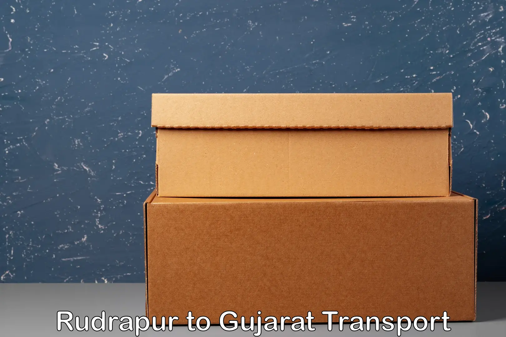 Pick up transport service Rudrapur to Gujarat