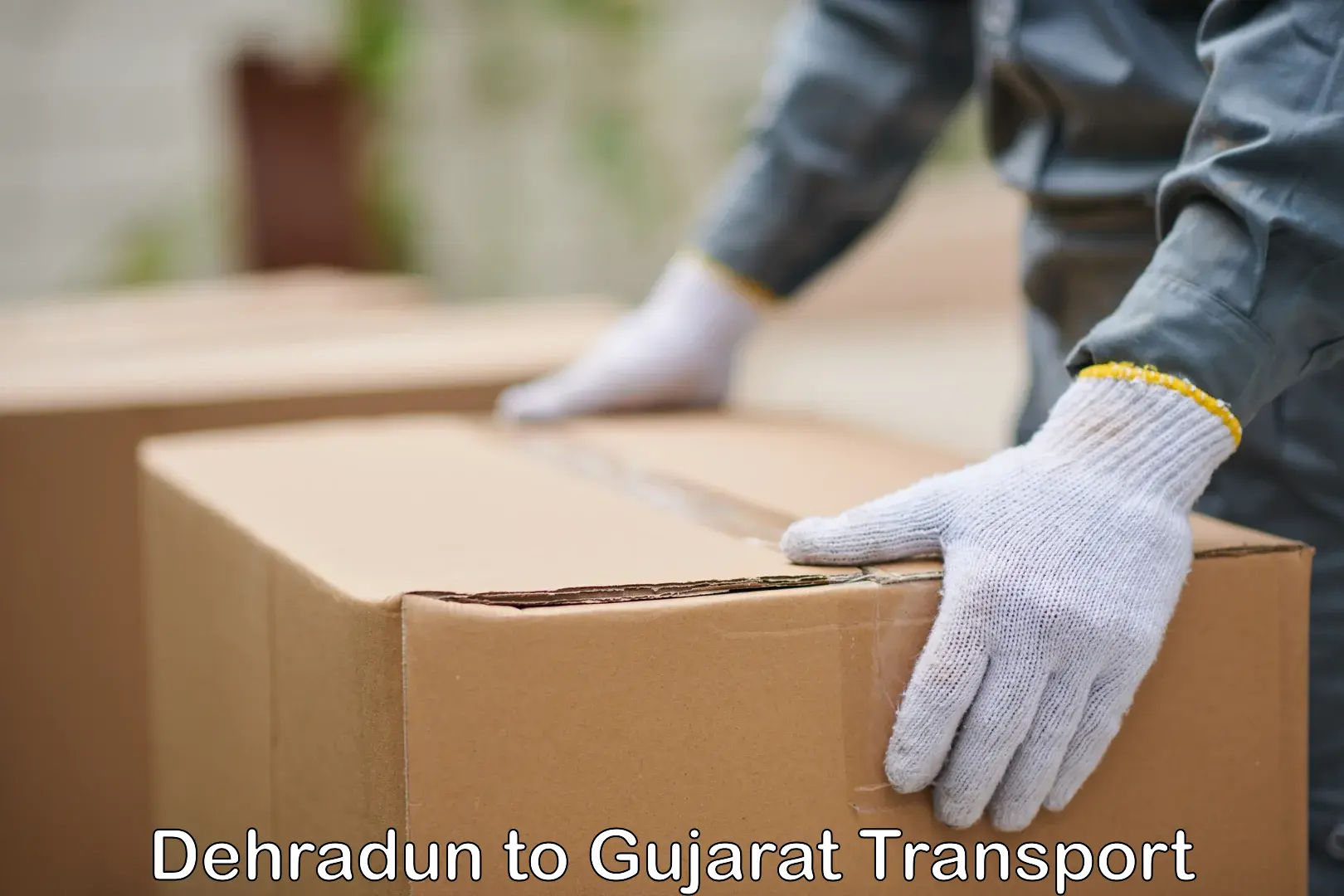 Interstate goods transport in Dehradun to Bharuch