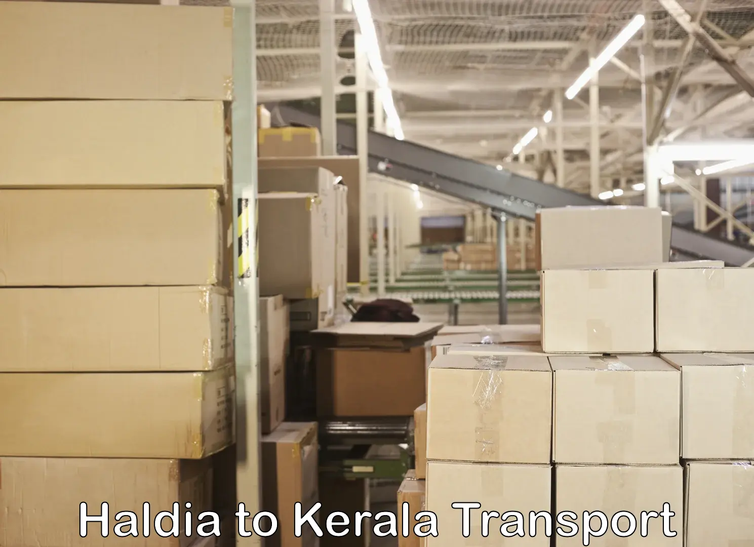 Two wheeler parcel service Haldia to Kallikkad